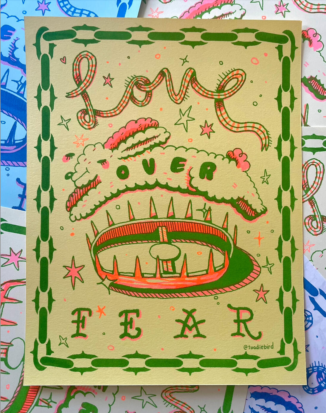"love over fear" 2 color riso print, 2024. "love over fear" 2 color riso print, 2024.